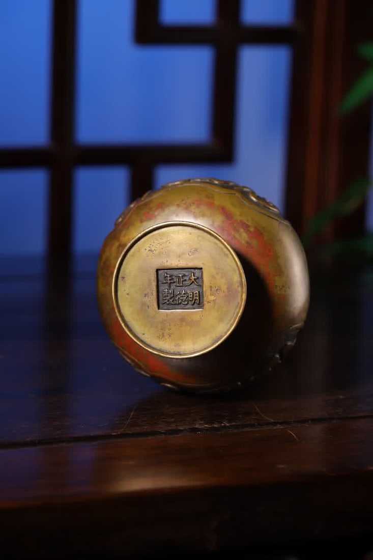 A Qing Dynasty copper Aven bottle - 9