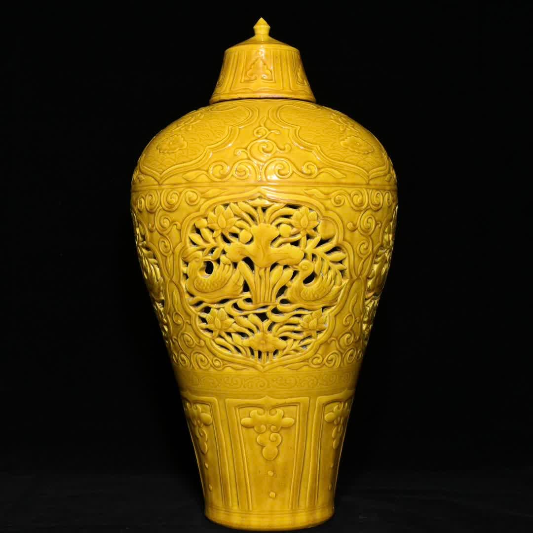 A bright yellow glaze hollow mandarin duck playing in the water pattern plum bottle: Bright yellow glaze hollow mandarin ducks playing in the water pattern plum bottle SIZE: H:46.3cm D:24.5cm (The Dimensions Of All Batches Are Manually Measured.If You Need More Detailed Information, P