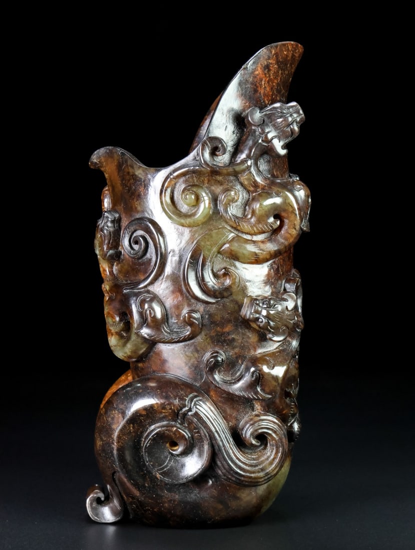 An Exquisite White Jade Chi-Dragon Pattern Goblet: An Exquisite White Jade Chi-Dragon Pattern Goblet Han Dynasty, China Size:19.5cmx9cmx8cm Weight:1.402kg (The Dimensions Of All Batches Are Manually Measured.If You Need More Detailed Information,