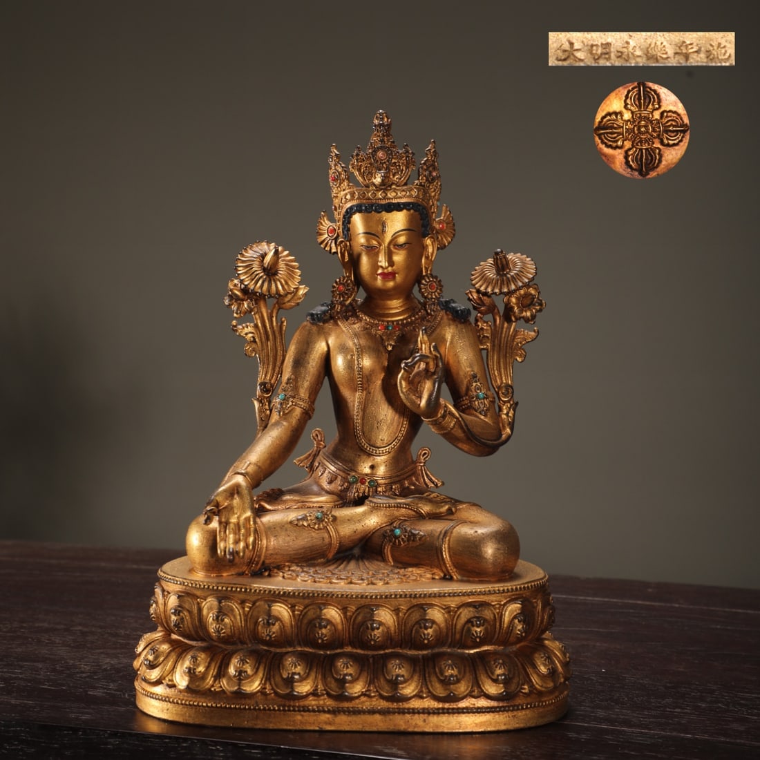 An Exquisite Gilt Bronze Inlaid Gems Statue of Tara: An Exquisite Gilt Bronze Inlaid Gems Statue of Tara Ming Dynasty, China Yongle Six-character Mark Size:21.5cmx15.3cm Weight:1750g (The Dimensions Of All Batches Are Manually Measured.If You Need More