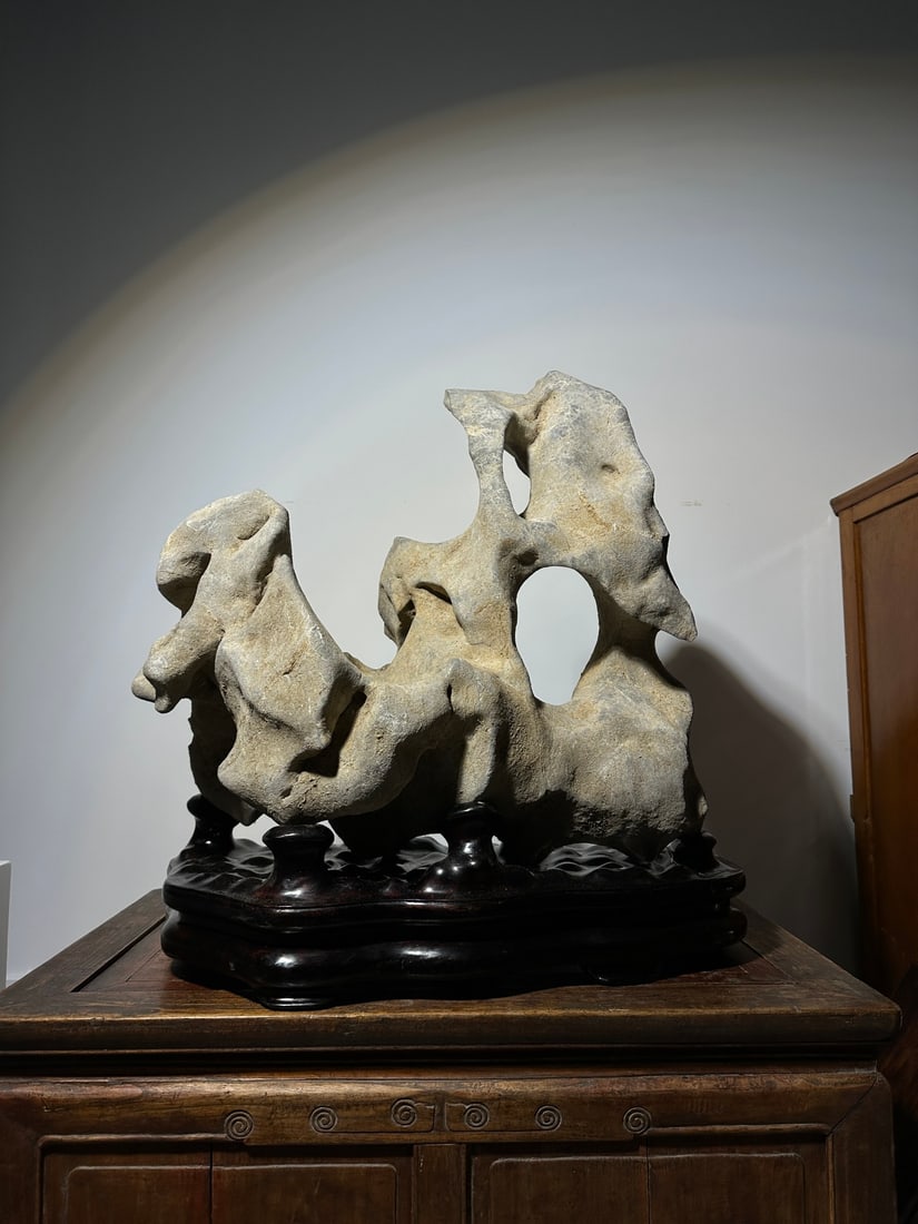 An Exquisite Taihu Stone Ornament: An Exquisite Taihu Stone Ornament Qing Dynasty, China Size:66cmx60cmx34cm (The Dimensions Of All Batches Are Manually Measured.If You Need More Detailed Information, Please Contact Our Customer
