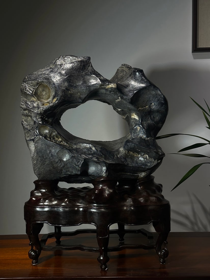 An Exquisite Taihu Stone Ornament: An Exquisite Taihu Stone Ornament Qing Dynasty, China Size:63cmx44cmx25cm (The Dimensions Of All Batches Are Manually Measured.If You Need More Detailed Information, Please Contact Our Customer