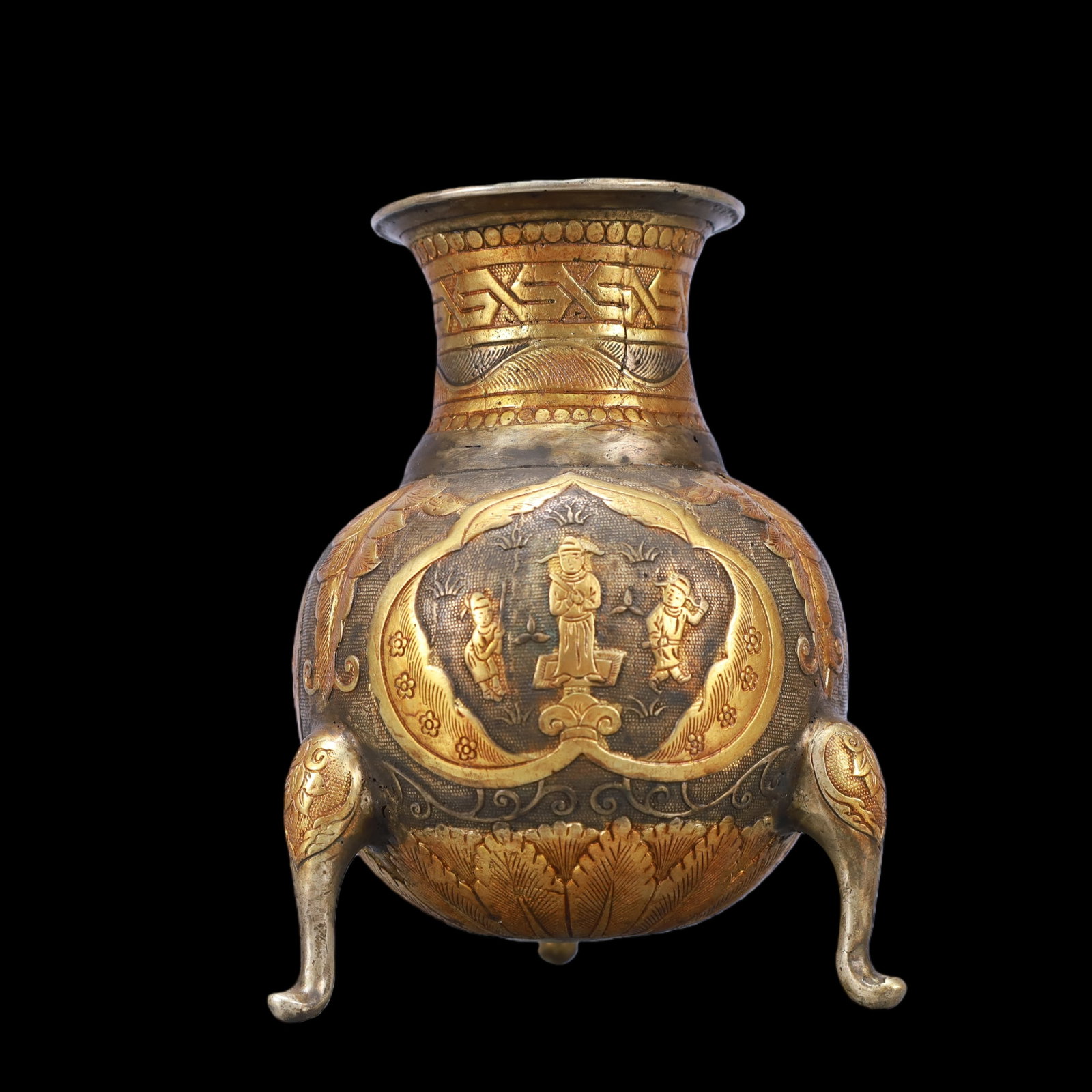 A Exquisite Gilt Silver Character and Story Pattern Tripod Vase: A Exquisite Gilt Silver Character and Story Pattern Tripod Vase Tang Dynasty, China Size:11.5cmx15cm Weight:750g (The Dimensions Of All Batches Are Manually Measured.If You Need More Detailed