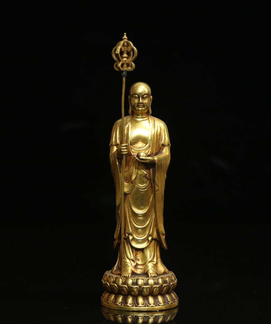 An Exquisite Gilt Bronze Statue of Kshitigarbha Bodhisattva Ornament: An Exquisite Gilt Bronze Statue of Kshitigarbha Bodhisattva Ornament Ming Dynasty, China Size:13.5cmx4cm Weight:338g (The Dimensions Of All Batches Are Manually Measured.If You Need More Detailed