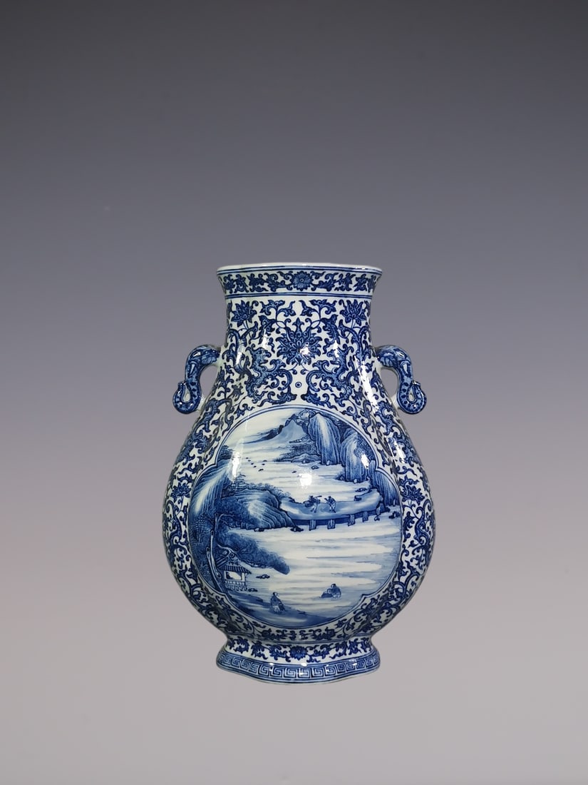 An Exquisite Blue and White Lotus Pattern Dragon Pattern Landscape and Figure Pattern Double-Ears: An Exquisite Blue and White Lotus Pattern Dragon Pattern Landscape and Figure Pattern Double-Ears Vase Qing Dynasty, China Qianlong Six-character Mark Size:37.5cmx25.5cm (The Dimensions Of All Batches