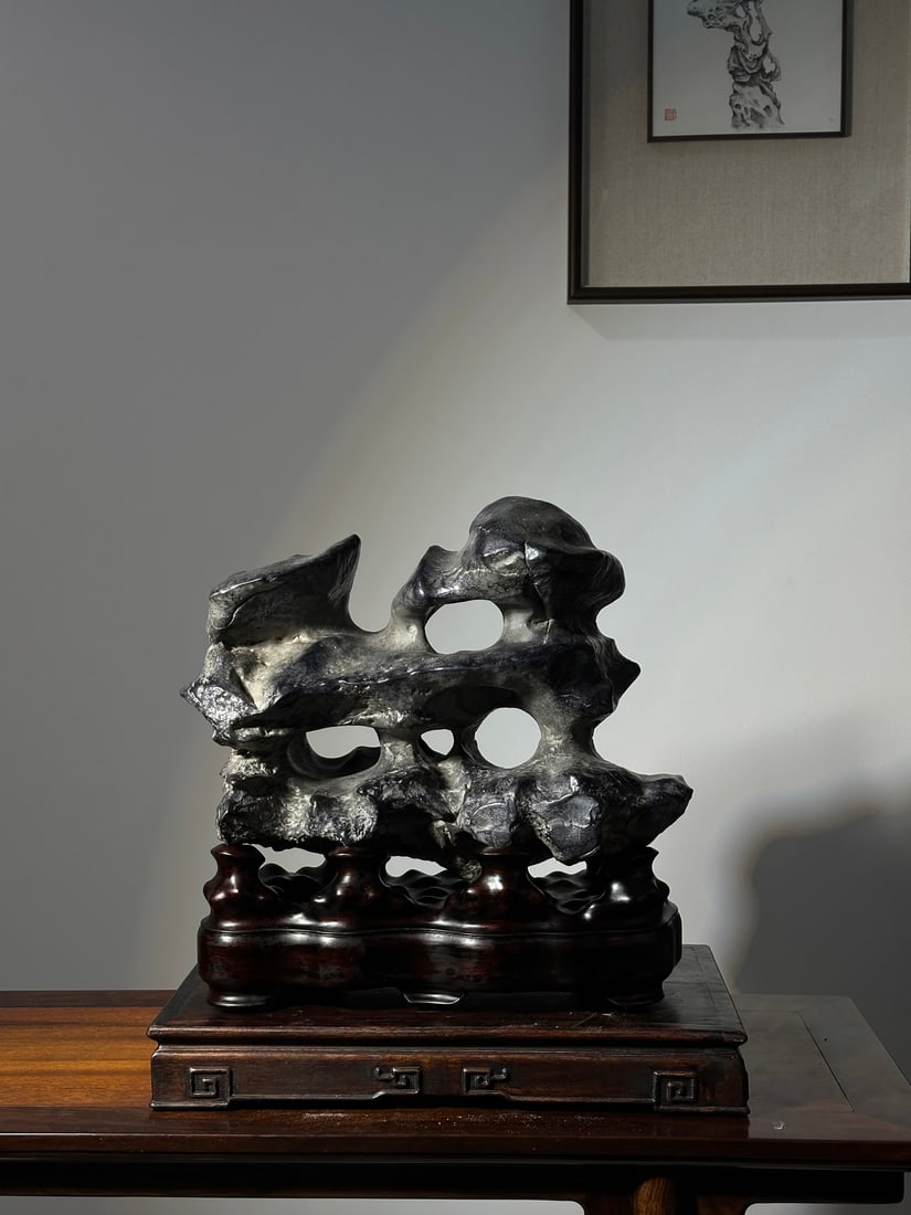 An Exquisite Taihu Stone Ornament: An Exquisite Taihu Stone Ornament Qing Dynasty, China Size:44cmx43cmx20cm (The Dimensions Of All Batches Are Manually Measured.If You Need More Detailed Information, Please Contact Our Customer