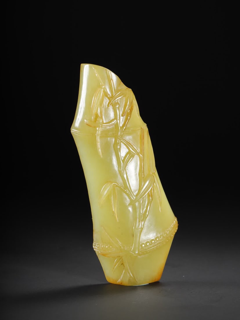 A Qing Dynasty Hetian topaz bamboo joint armrest: Qing Dynasty Hetian topaz bamboo joint pattern arm rest SIZE: 11.5x4.7x1.3cm W:77.2g (The Dimensions Of All Batches Are Manually Measured.If You Need More Detailed Information, Please Contact Our