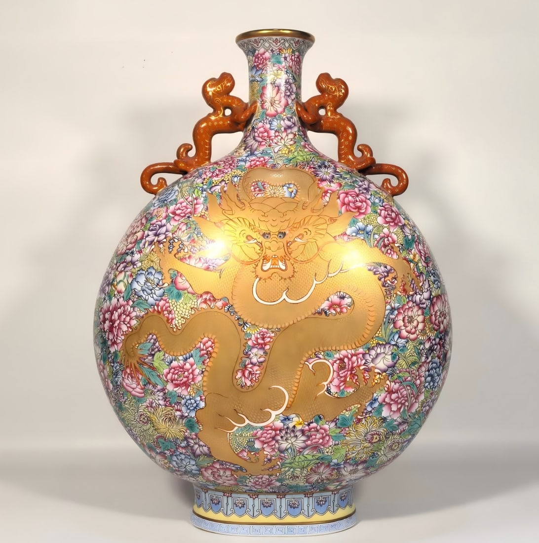 A Qing Dynasty Qianlong enamel kaleidoscope double dragon moon vase: Qing Dynasty Qianlong enamel color kaleidoscope double dragon holding the moon bottle SIZE: H: 49cm MouthD: 8cm Belly diameter 36cm Foot diameter 17cm (The Dimensions Of All Batches Are Manually