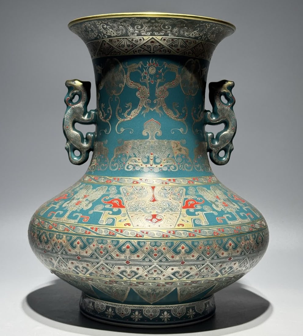 A Qing Dynasty Qianlong model peacock green glaze gilded silver dragon and phoenix elephant: Qing Dynasty Qianlong peacock green glaze gilded silver dragon and phoenix elephant gluttonous pattern amphora cup SIZE: H:30.3cm W:24cm (The Dimensions Of All Batches Are Manually Measured.If You Nee