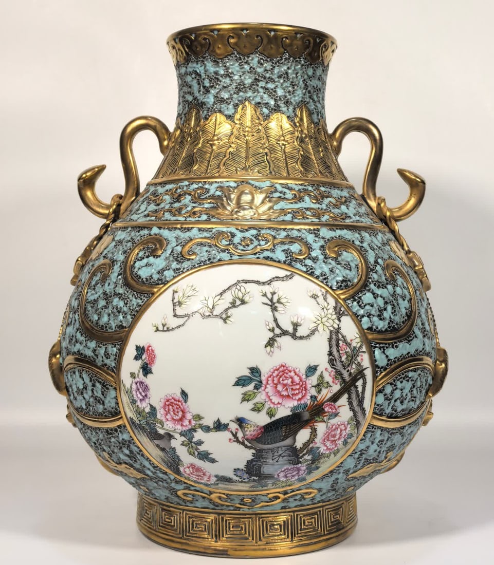 A Qing Dynasty Qianlong enamel bronze glaze gilded window flower and bird ruyi ear vase: Qing Dynasty Qianlong enamel bronze glaze gilded window flower and bird ruyi ear vase SIZE: H: 35.5cm MouthD: 12cm Belly diameter 27cm Foot diameter 15.5cm (The Dimensions Of All Batches Are Manually