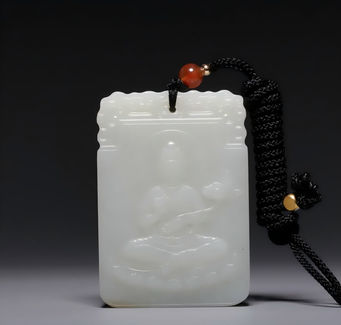 A Qing Dynasty Hetian white jade Guanyin plaque (1 of 9)