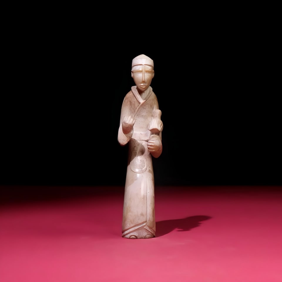 A Han Dynasty jade bird tamer: Han Dynasty jade tamer birdman SIZE: 168x41x28mm W:252g (The Dimensions Of All Batches Are Manually Measured.If You Need More Detailed Information, Please Contact Our Customer Service Before Bidding.)