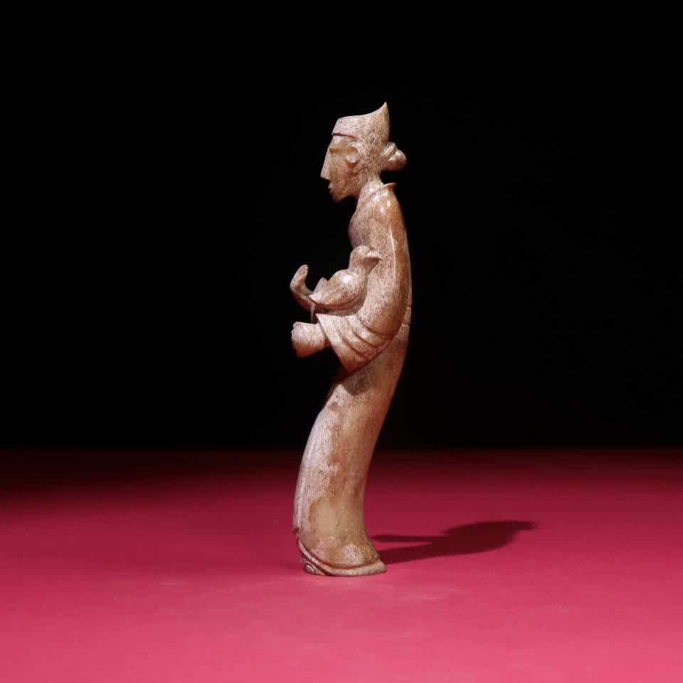 A Han Dynasty jade bird tamer - 5