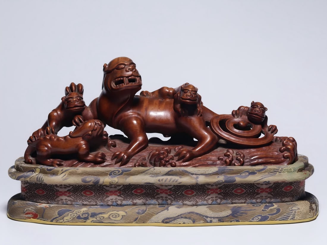 A Qing Dynasty sandalwood dragon ornament (1 of 9)