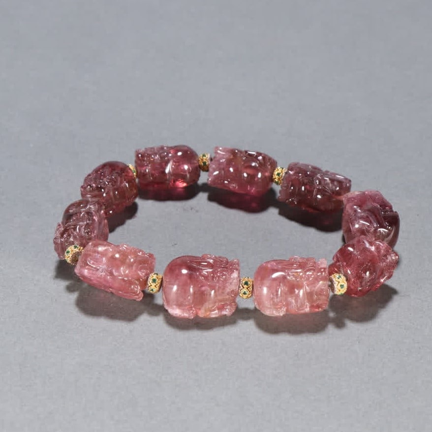 A Qing Dynasty tourmaline Pixiu bracelet (1 of 9)