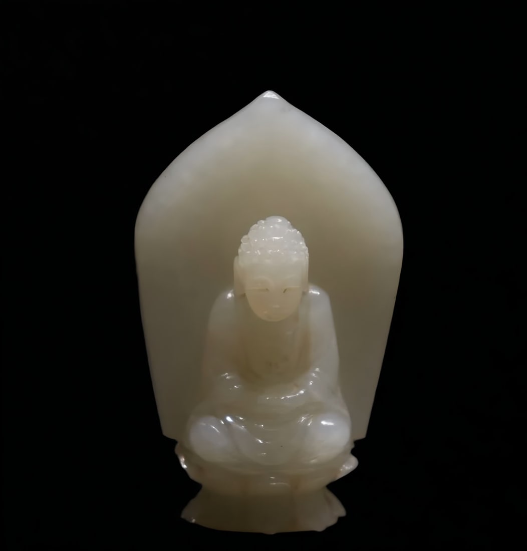 A piece of Hetian white jade Buddha in the Qing Dynasty should be Shakyamuni Buddha: The white jade Buddha of Hetian in the Qing Dynasty should be Shakyamuni Buddha SIZE: H:5.53cm W:26.8g (The Dimensions Of All Batches Are Manually Measured.If You Need More Detailed Information,