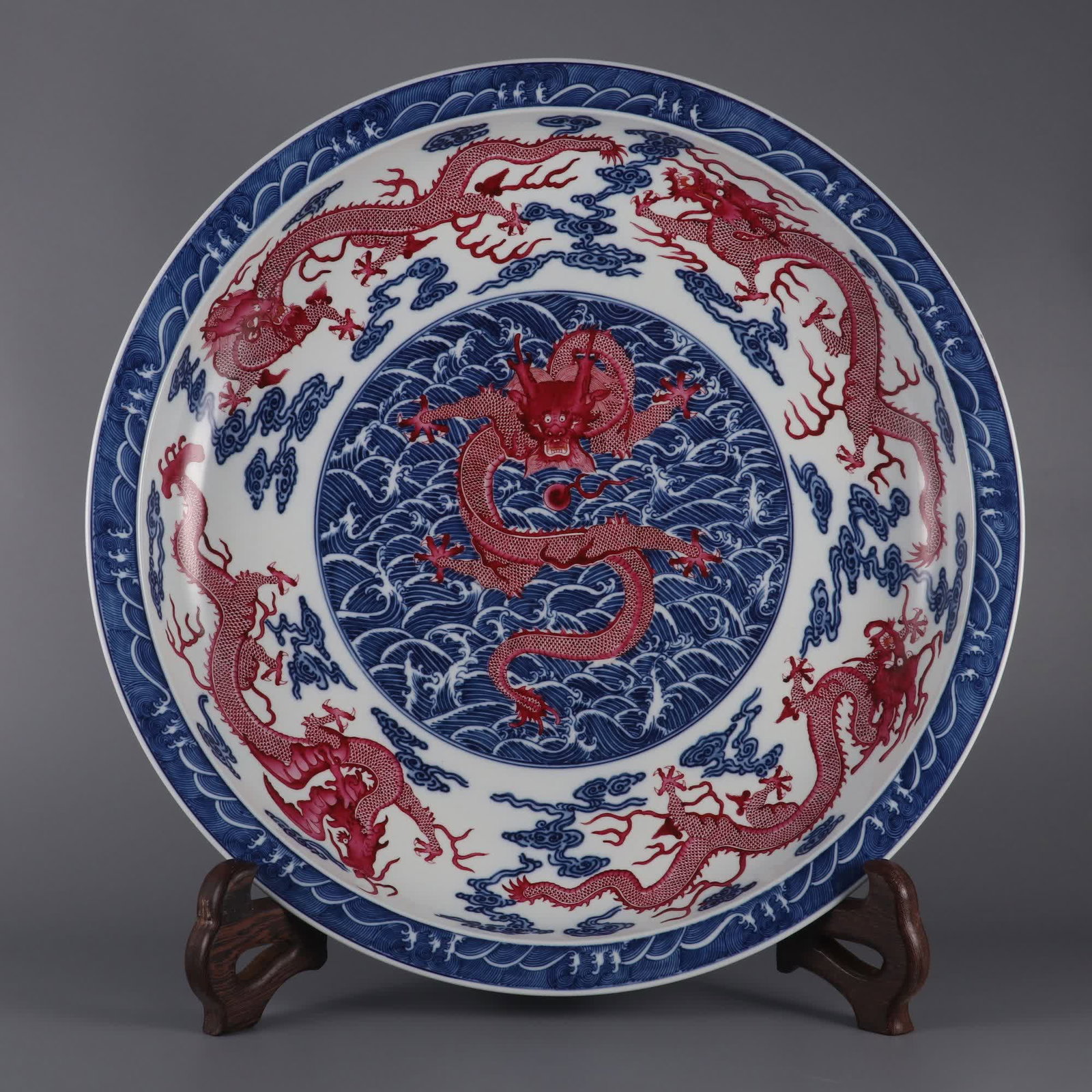 A large plate of blue and white blue and red seawater nine dragon pattern folded in the Qing Dynasty (1 of 9)