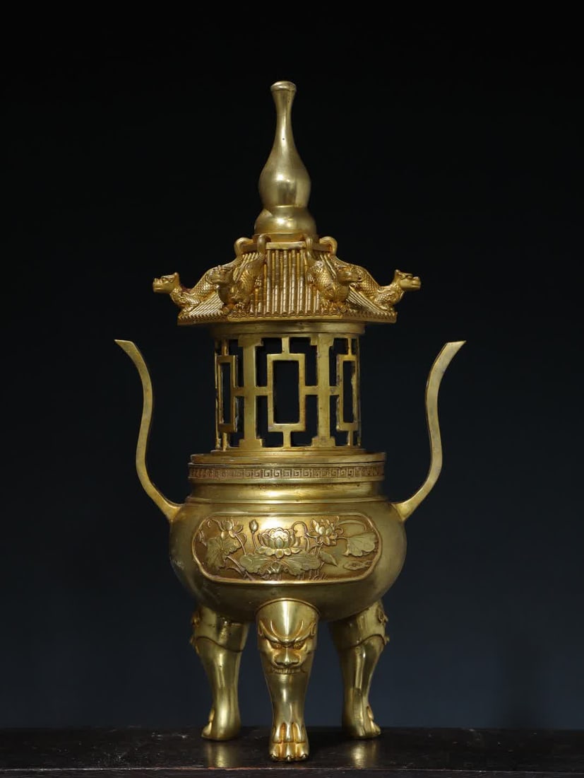 A Qing Dynasty copper-gilt three-legged lotus incense burner: Qing Dynasty copper gilt three-legged lotus incense burner SIZE: DataH: 50cm W: 27cm MouthD: 12cm W: 3.95kg (The Dimensions Of All Batches Are Manually Measured.If You Need More Detailed Information,