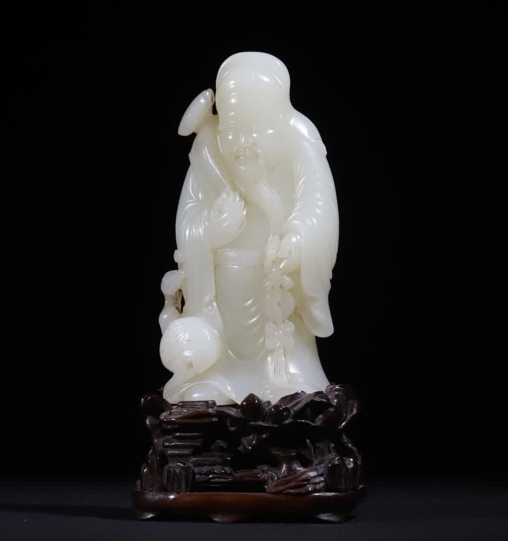 A Qing Dynasty Hetian white jade carved God of Wealth (1 of 10)