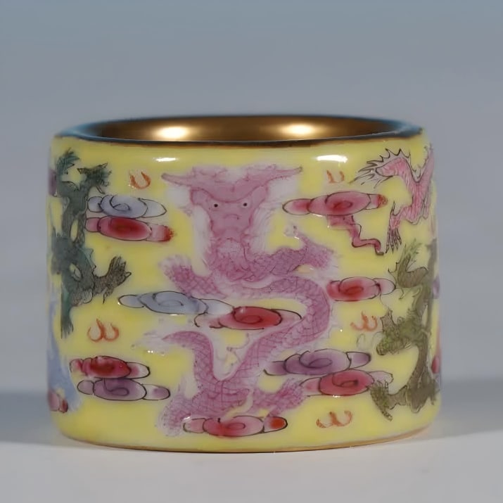 A Qing Dynasty Qianlong yellow ground Kowloon board finger: Qing Dynasty Qianlong Huangdi Kowloon Board Finger SIZE: H: 2.5cm mouth 3cm bottom 3.2cm (The Dimensions Of All Batches Are Manually Measured.If You Need More Detailed Information, Please Contact Our