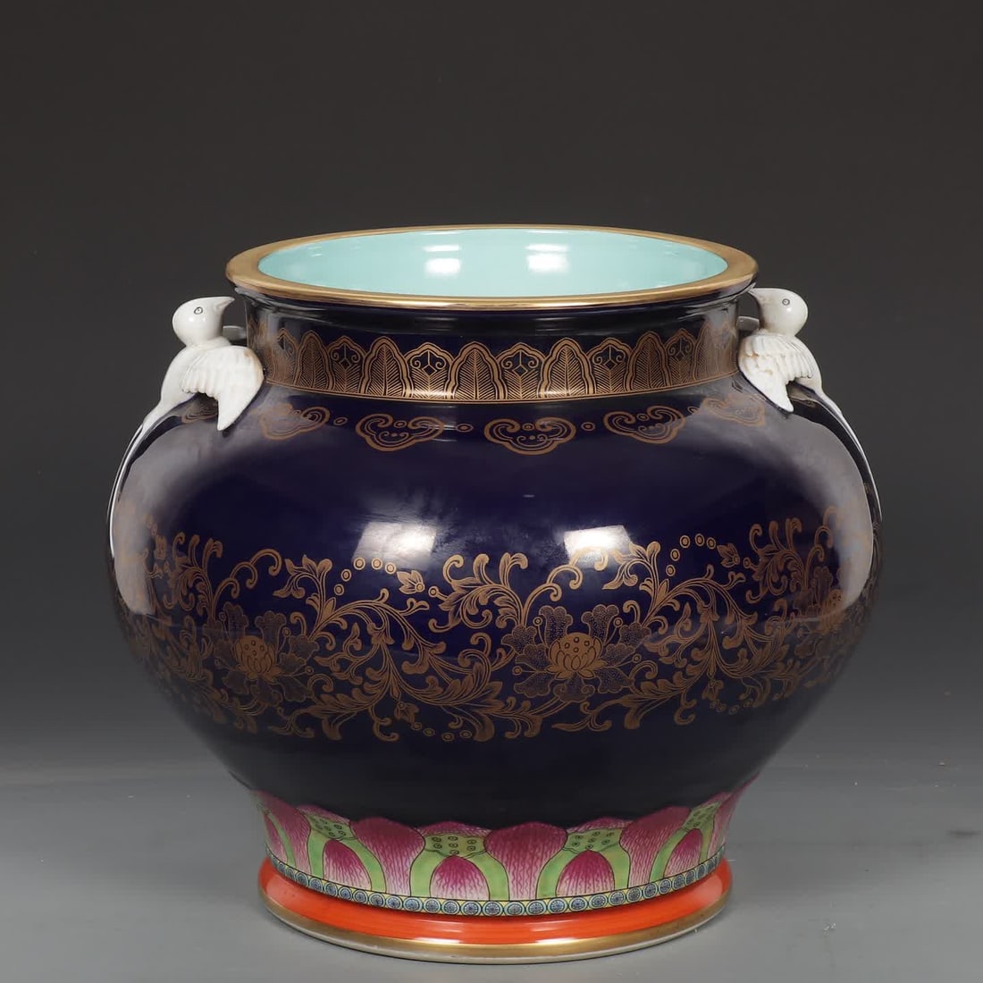 A Qing Dynasty Qianlong blue pastel gold-painted lotus double swallow ear statue: Qing Dynasty Qianlong Ji blue pastel gilded lotus double swallow ear statue SIZE: H: 31cm MouthD: 25cm Belly diameter 37cm (The Dimensions Of All Batches Are Manually Measured.If You Need More