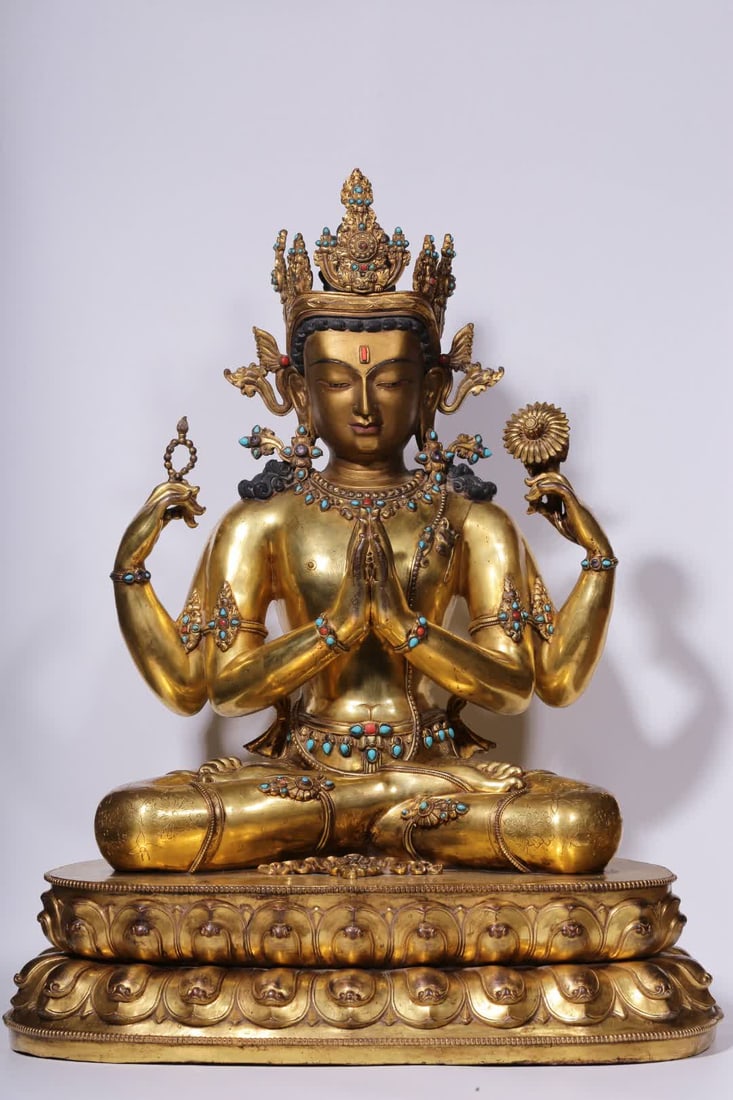 A Qing Dynasty copper-gilt turquoise four-armed seated statue of Guanyin: Qing Dynasty copper gilt inlaid turquoise four-armed Guanyin seated statue SIZE: H:63cm L:49cm W:35cm W:26kg (The Dimensions Of All Batches Are Manually Measured.If You Need More Detailed
