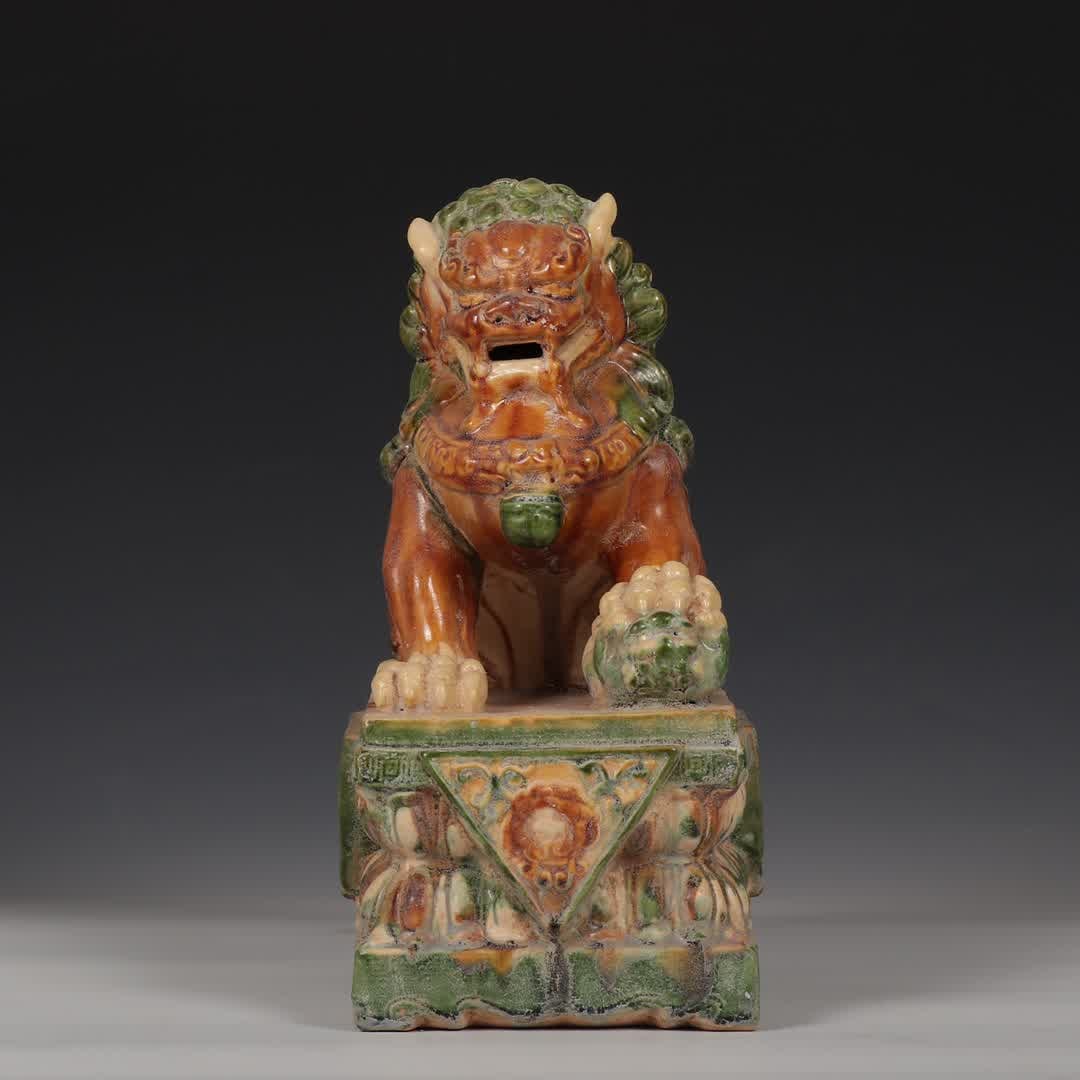 A Tang Dynasty three-colored lion beast ornament: Tang Dynasty three-color lion beast ornament SIZE: H:28cm L:18.5cm W:12.5cm (The Dimensions Of All Batches Are Manually Measured.If You Need More Detailed Information, Please Contact Our Customer