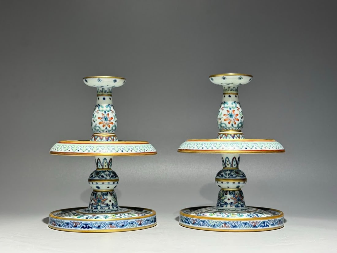 A Qing Dynasty Qianlong model Doucai entwined lotus pattern candlestick: Qing Dynasty Qianlong model Doucai entwined lotus pattern candlestick SIZE: H:17.3cm W:13cm (The Dimensions Of All Batches Are Manually Measured.If You Need More Detailed Information, Please Contact O