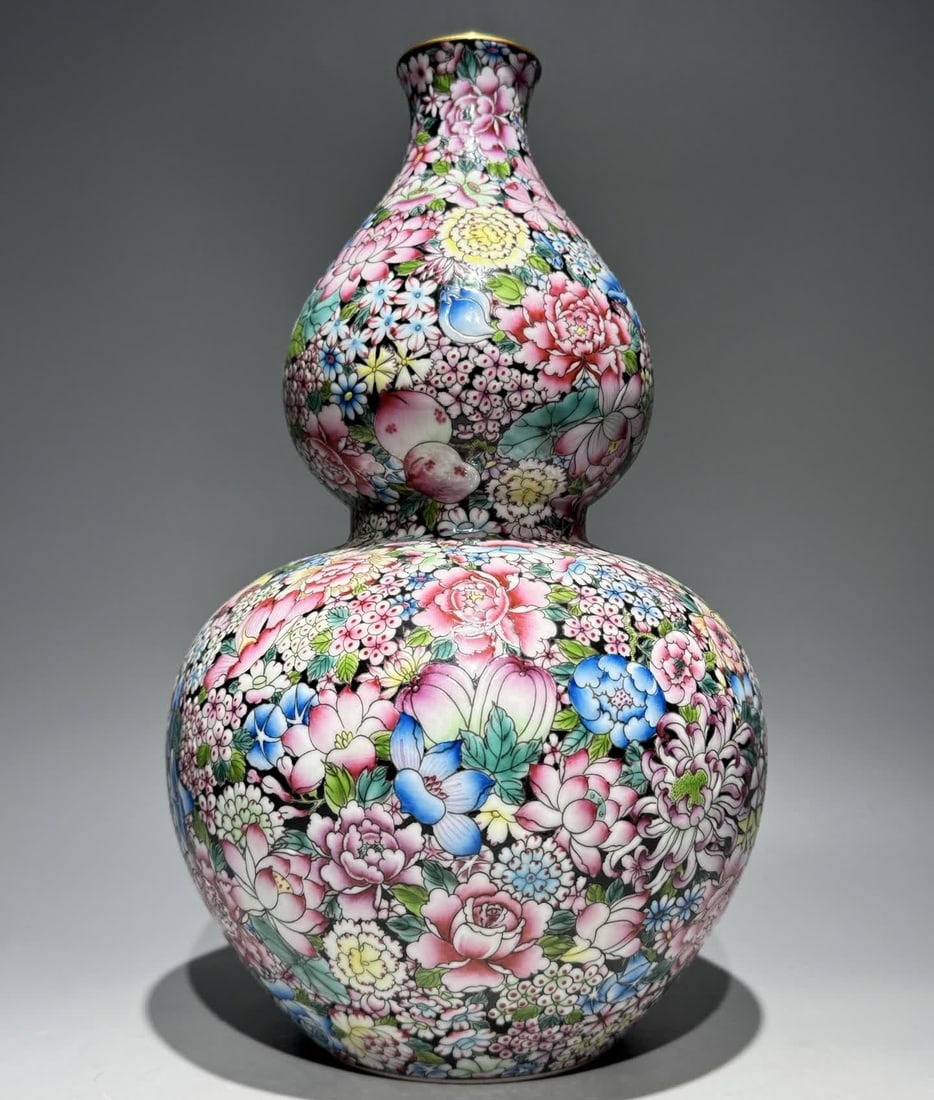 A Qing Dynasty Qianlong pastel black background kaleidoscope gourd bottle: Qing Dynasty Qianlong pastel black background kaleidoscope gourd bottle SIZE: H:33.8cm W:20cm (The Dimensions Of All Batches Are Manually Measured.If You Need More Detailed Information, Please Contact