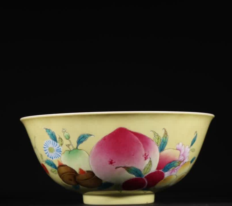 A Qing Dynasty Jiaqing pastel yellow glazed melon and fruit pattern inscription bowl (1 of 9)