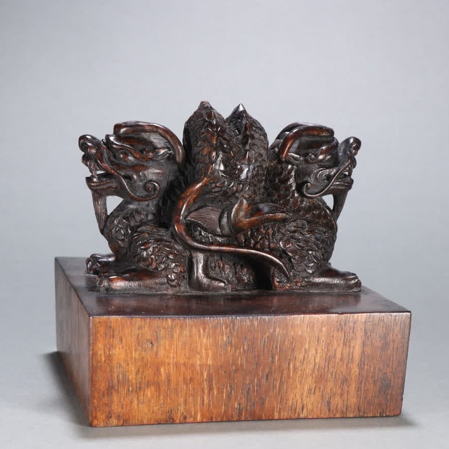 A Qing Dynasty agarwood dragon button seal (1 of 9)