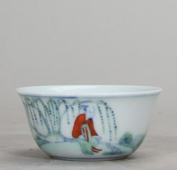 A Qing Dynasty Kangxi Doucai righteous son loves goose lying foot cup: Qing Dynasty Kangxi Doucai Yizi loves goose lying foot cup SIZE: H:2.8cm MouthD:6.4cm (The Dimensions Of All Batches Are Manually Measured.If You Need More Detailed Information, Please Contact Our