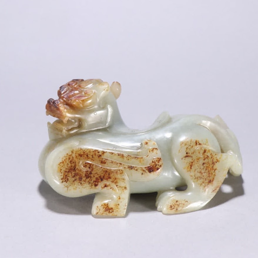 A Han Dynasty Hetian jade seed material auspicious beast ornament (1 of 9)