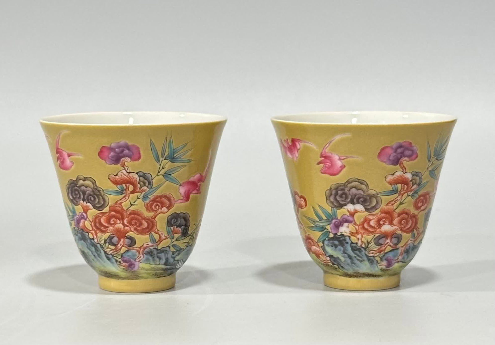 A Qing Dynasty Yongzheng enamel color beige glaze auspicious pattern cup (1 of 9)