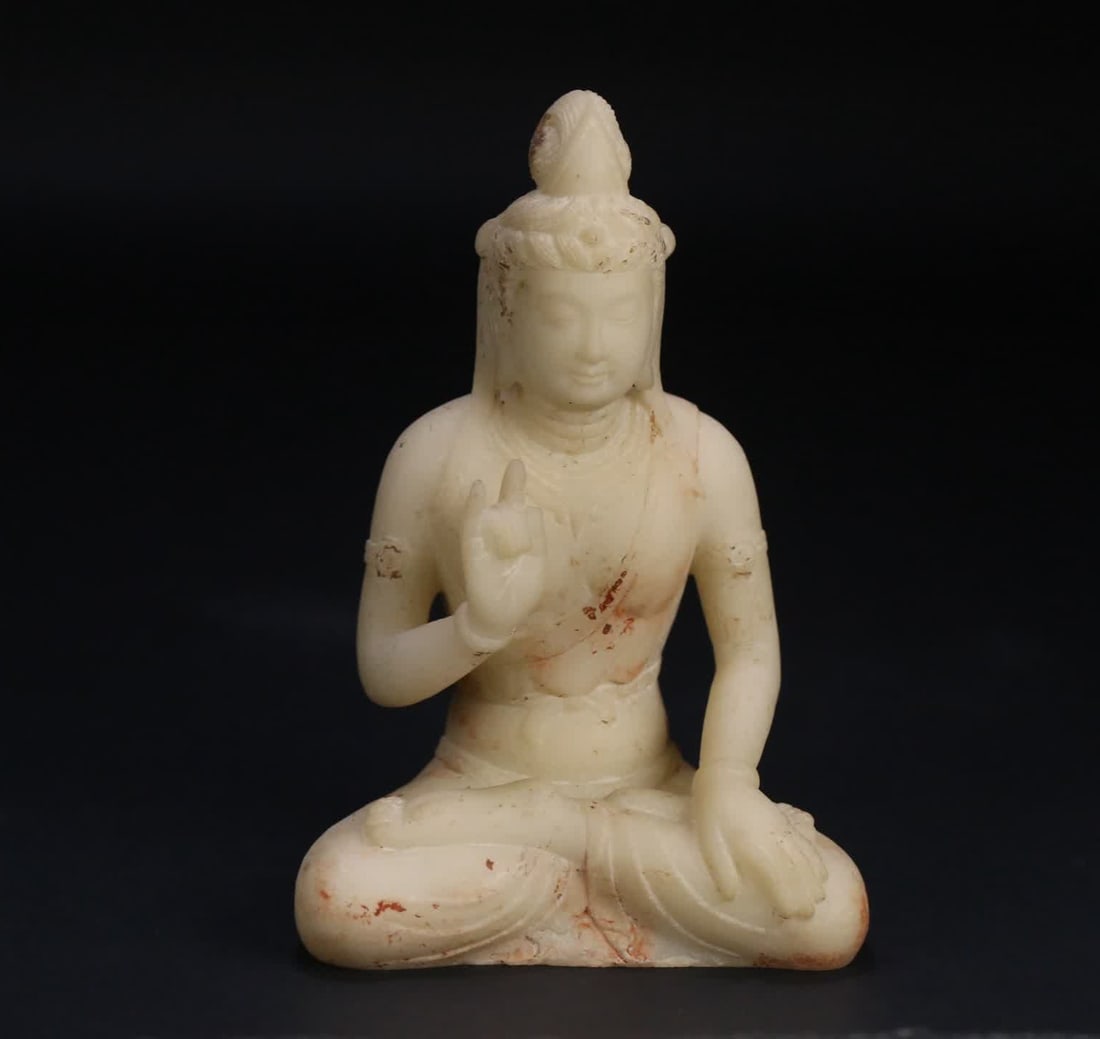 A seated white jade statue of Guanyin: White jade seated statue of Guanyin SIZE: 12.5x8.5x6.7cm W:425.3g (The Dimensions Of All Batches Are Manually Measured.If You Need More Detailed Information, Please Contact Our Customer Service