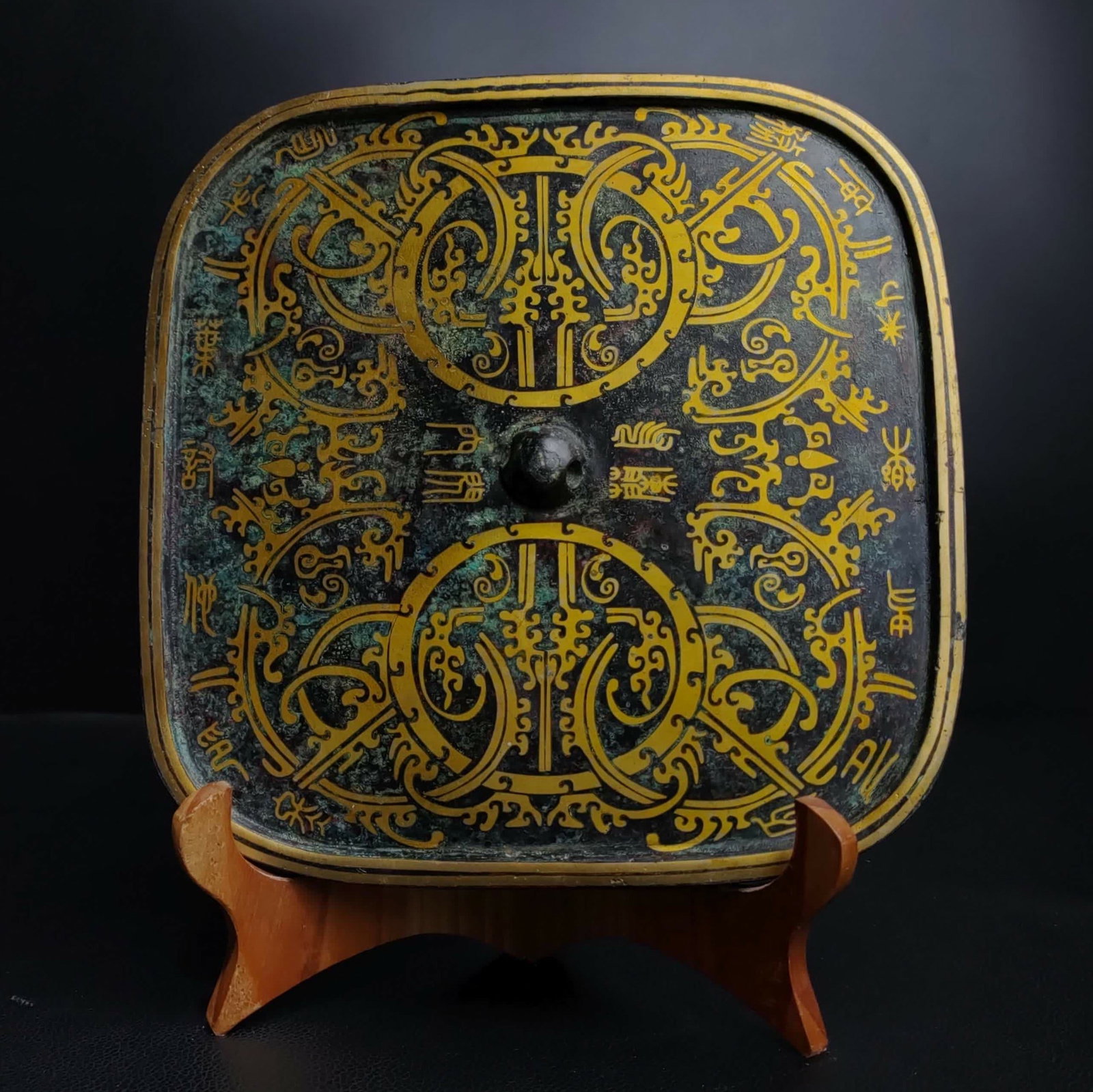 A Han Dynasty Cuojin square bronze mirror: Han Dynasty Cuojin square bronze mirror SIZE: H:22cm W:22cm W:1.4kg (The Dimensions Of All Batches Are Manually Measured.If You Need More Detailed Information, Please Contact Our Customer Service