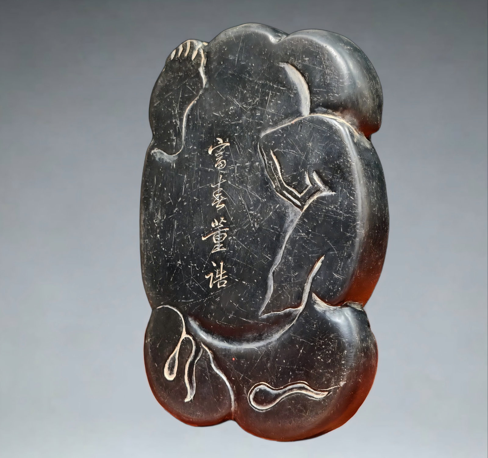 A dragon pattern end inkstone signed by Dong Gao - 4