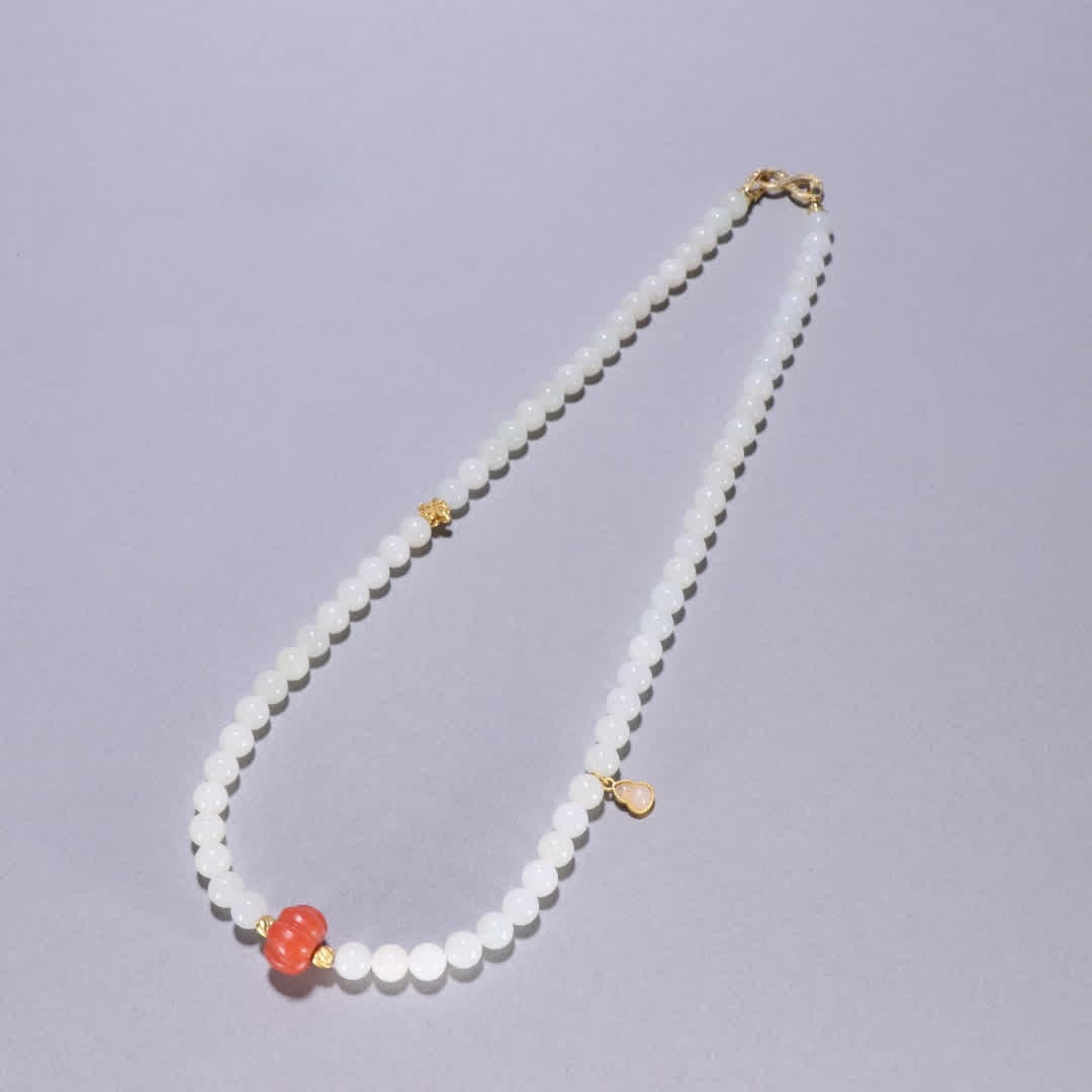 A Qing Dynasty Hetian jade necklace: Qing Dynasty Hetian jade necklace SIZE: Bead diameter 0.8cm W: 62.9g (The Dimensions Of All Batches Are Manually Measured.If You Need More Detailed Information, Please Contact Our Customer Service