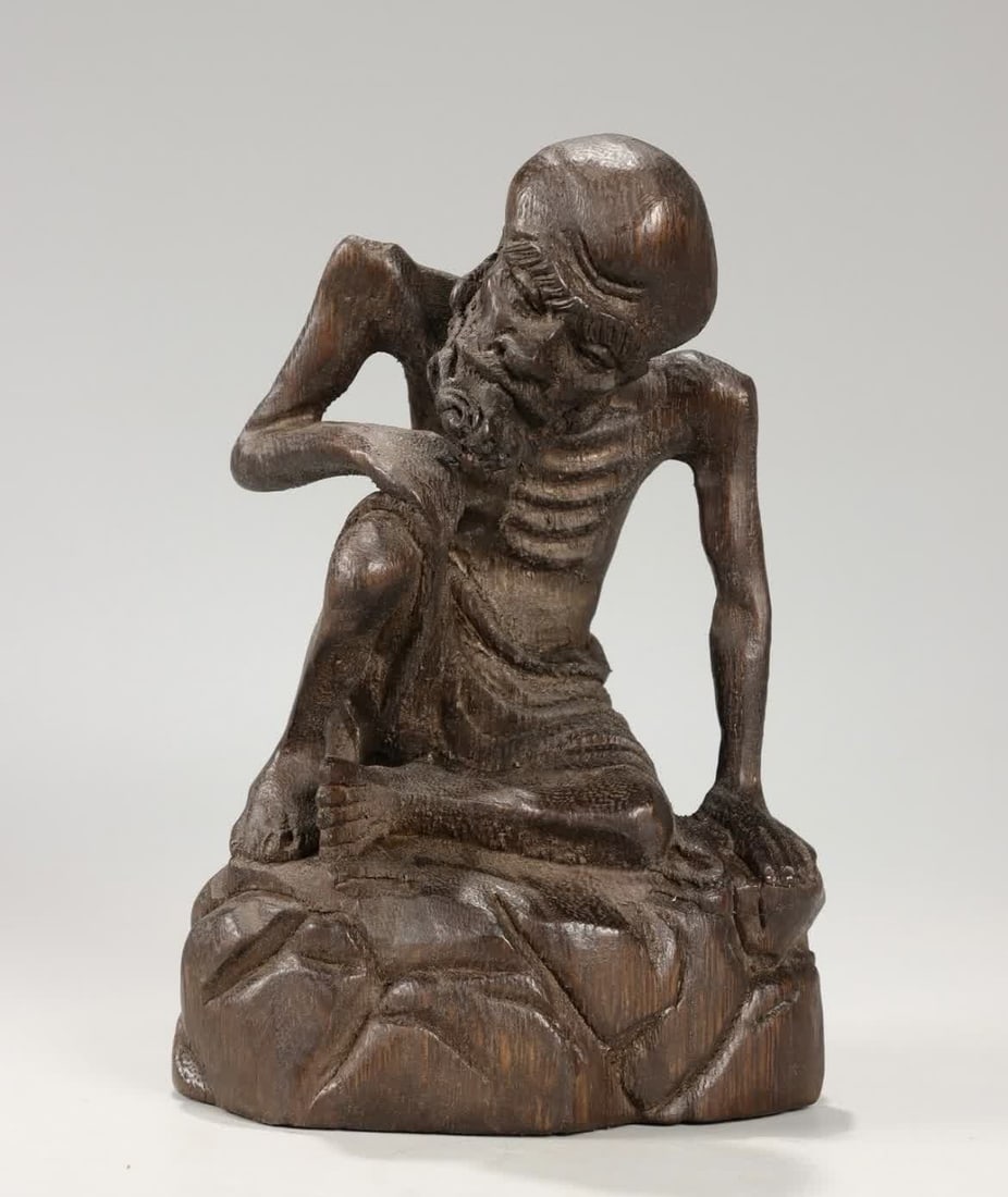 A Qing Dynasty Qinan agarwood carving Arhat ornament: Qing Dynasty Qinan agarwood carving Arhat ornament SIZE: H:7.5cm L:12cm W:8.5cm W:148.5g (The Dimensions Of All Batches Are Manually Measured.If You Need More Detailed Information, Please Contact Our