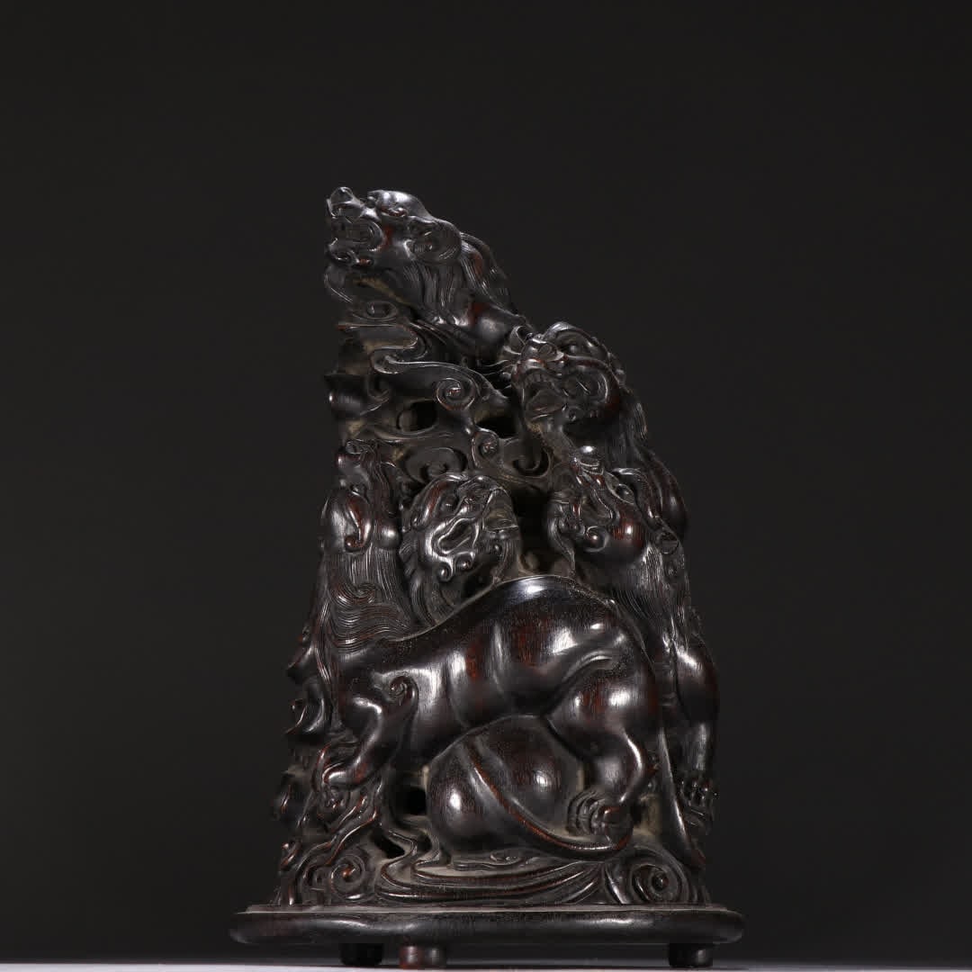 A Qing Dynasty rosewood lion roar aromatherapy stove (1 of 9)