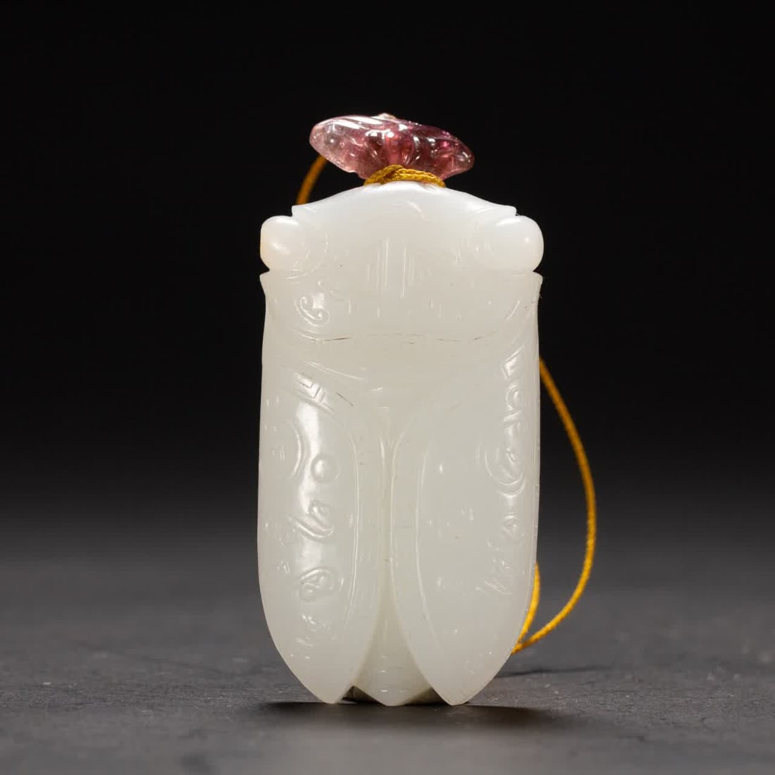 A Qing Dynasty Hetian jade cicada: Qing Dynasty Hetian jade cicada SIZE: L:7.5cm W:3.5cm W:70g (The Dimensions Of All Batches Are Manually Measured.If You Need More Detailed Information, Please Contact Our Customer Service Before Biddi