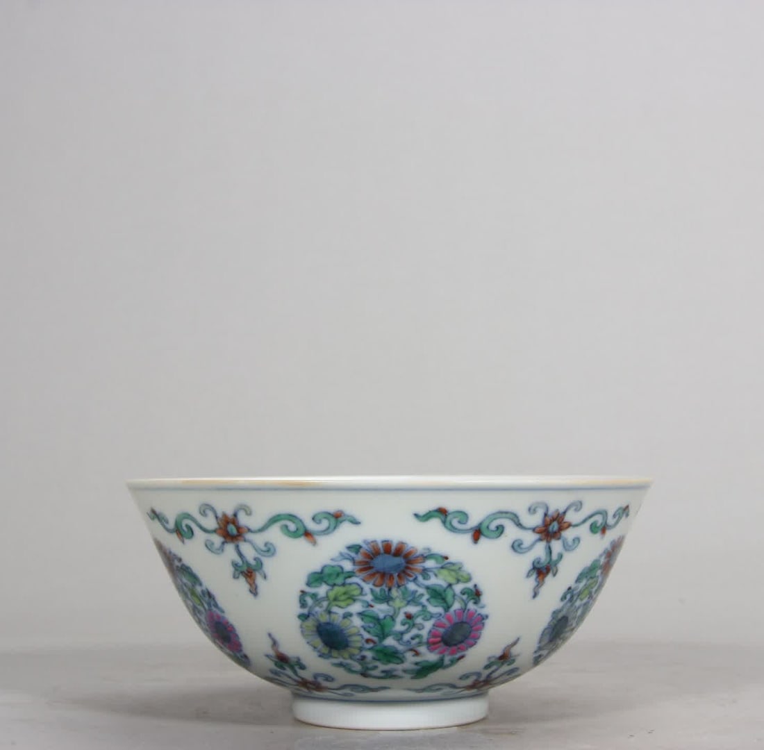 A Qing Dynasty Yongzheng Doucai Tuan chrysanthemum bowl: Qing Dynasty Yongzheng Doucai Tuan Chrysanthemum Bowl SIZE: H:5.7cm D:12.5cm (The Dimensions Of All Batches Are Manually Measured.If You Need More Detailed Information, Please Contact Our Customer Ser