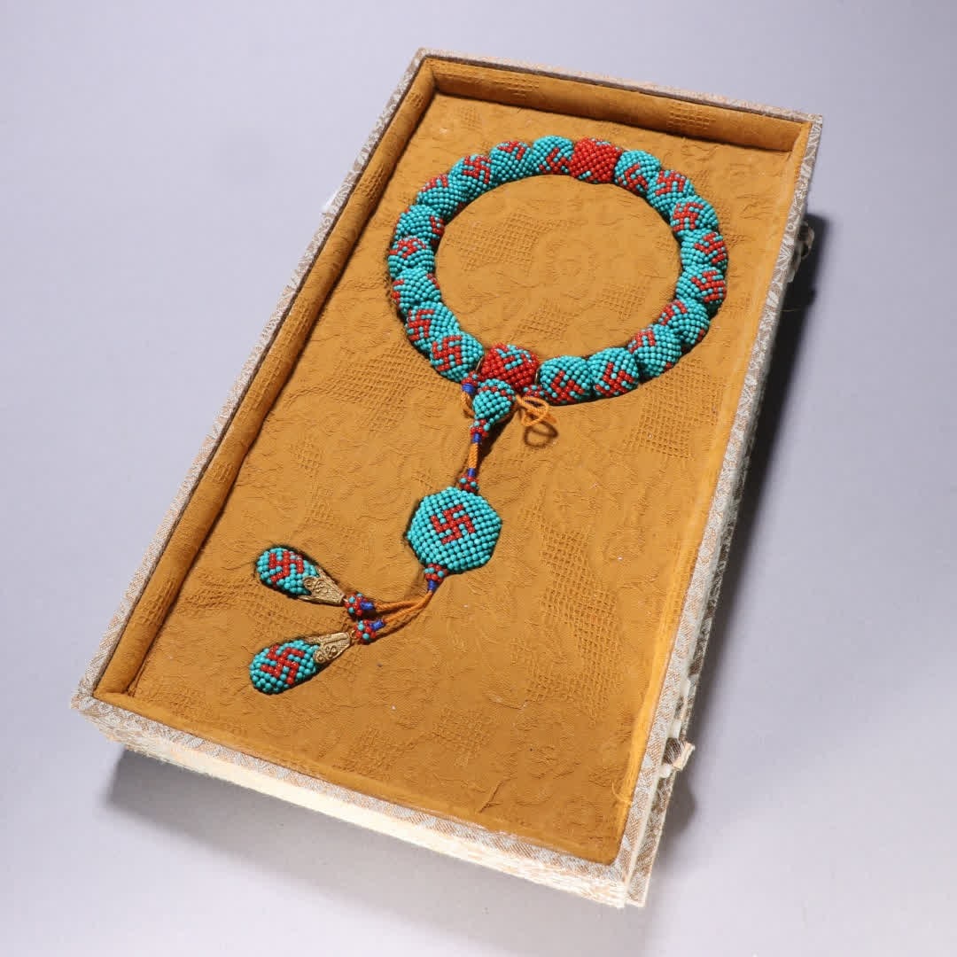 A piece of Qing Dynasty turquoise wrapped agarwood inlaid rice swastika pattern eighteen sons (1 of 9)