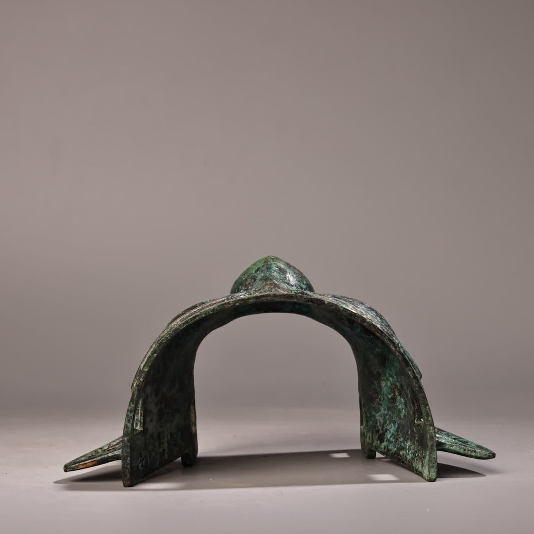 A bronze three-star mask - 5