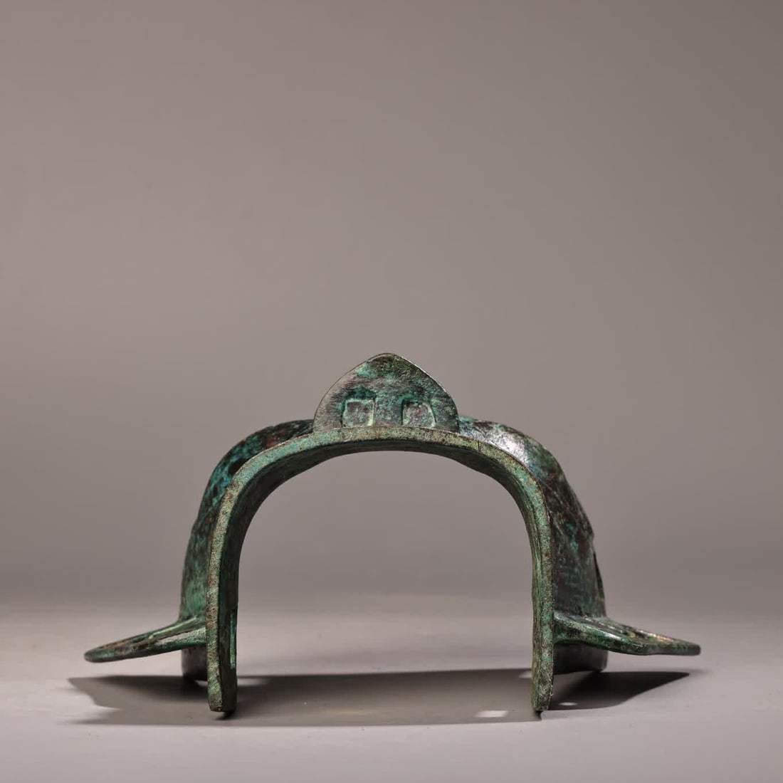 A bronze three-star mask - 6