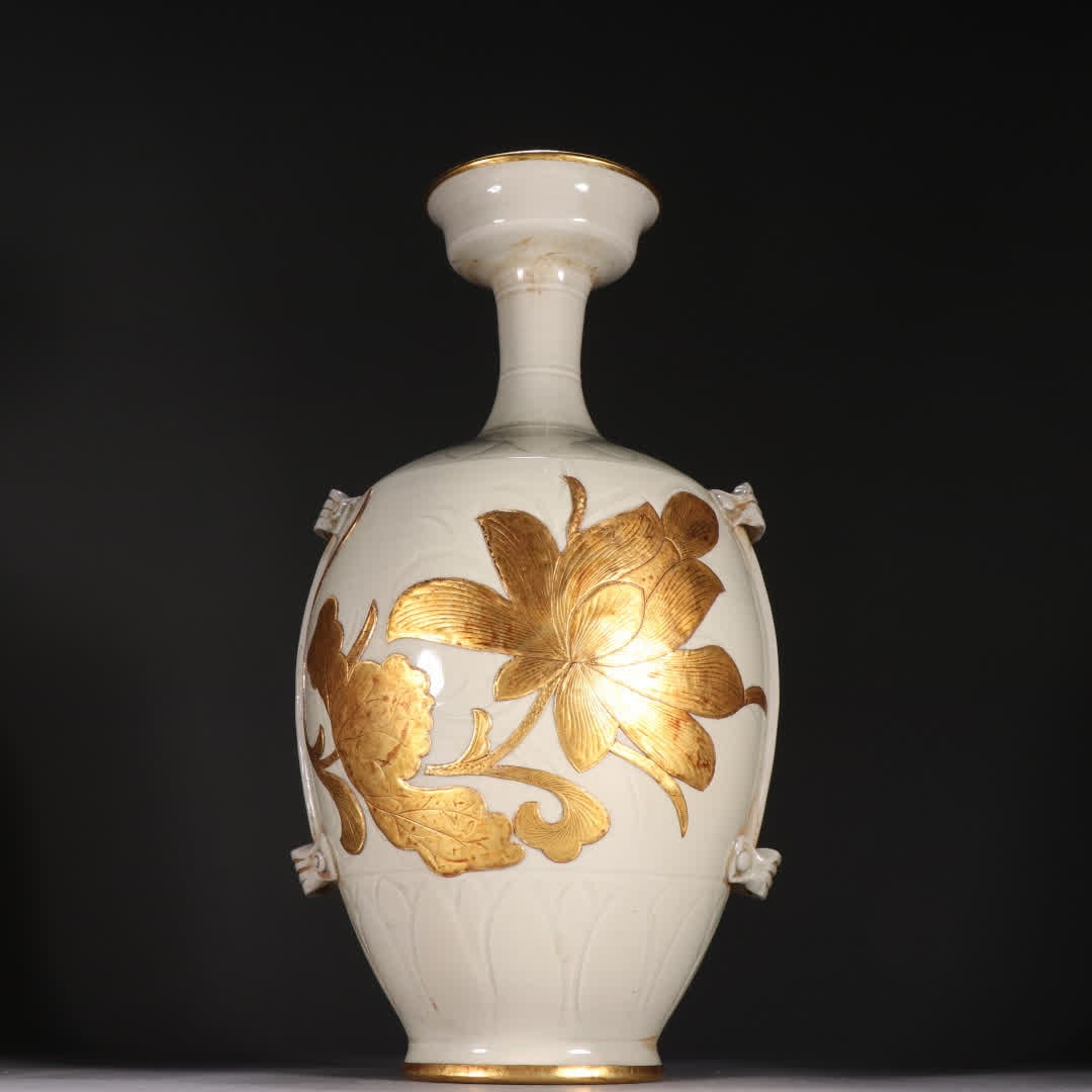 A Song Ding kiln white glaze lotus pattern wearing a belt bottle: Song Ding kiln white glaze lotus pattern wearing a belt bottle SIZE: H:31cm W:16cm (The Dimensions Of All Batches Are Manually Measured.If You Need More Detailed Information, Please Contact Our