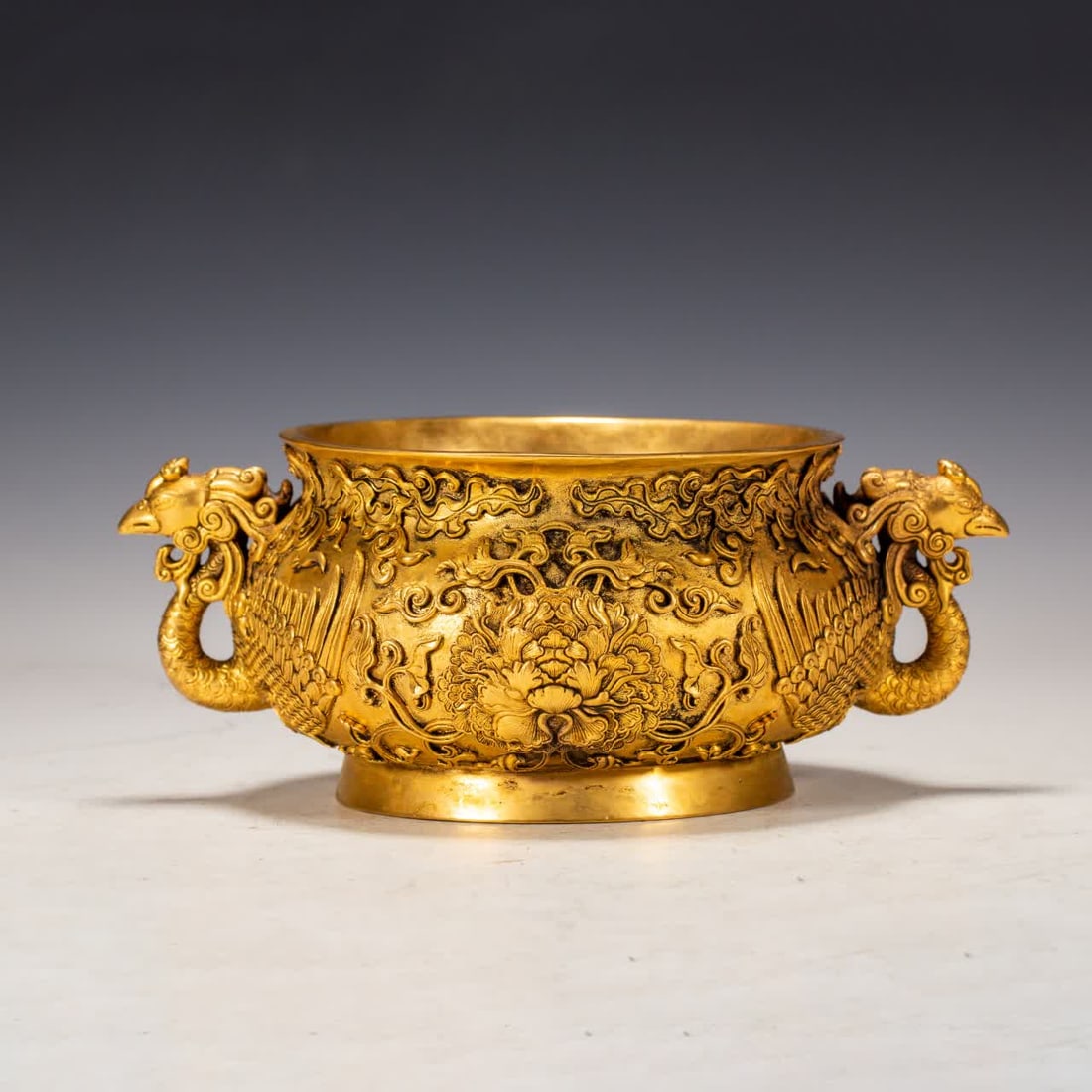 A Qing Dynasty copper gilt phoenix ear furnace: Qing Dynasty copper gilt phoenix ear furnace SIZE: L:23cm W:16cm H:10cm W:2270g (The Dimensions Of All Batches Are Manually Measured.If You Need More Detailed Information, Please Contact Our Customer