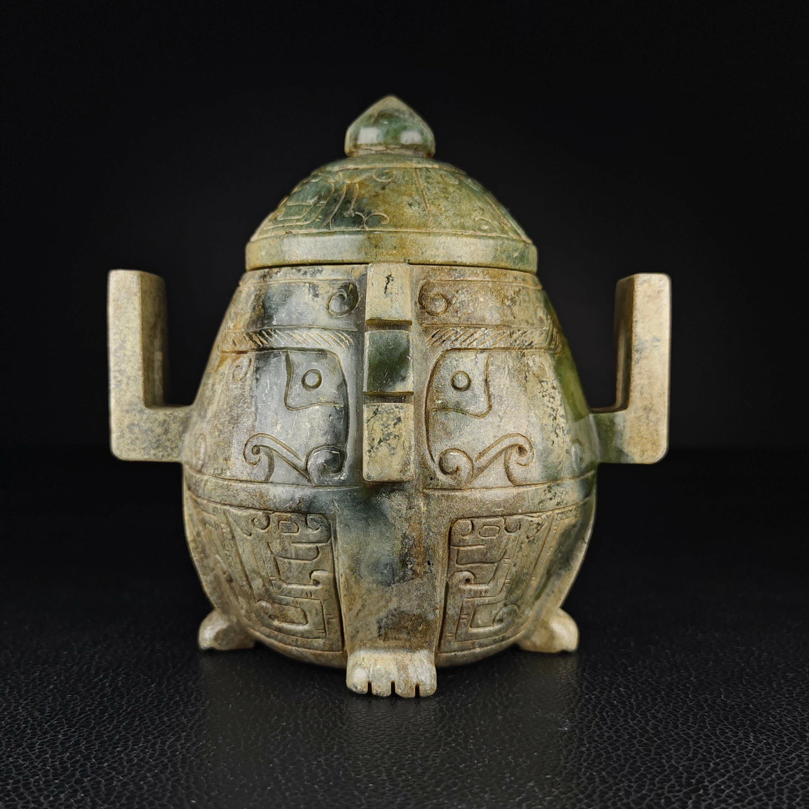 A Han Dynasty Hetian jade amphora lid tripod (1 of 8)