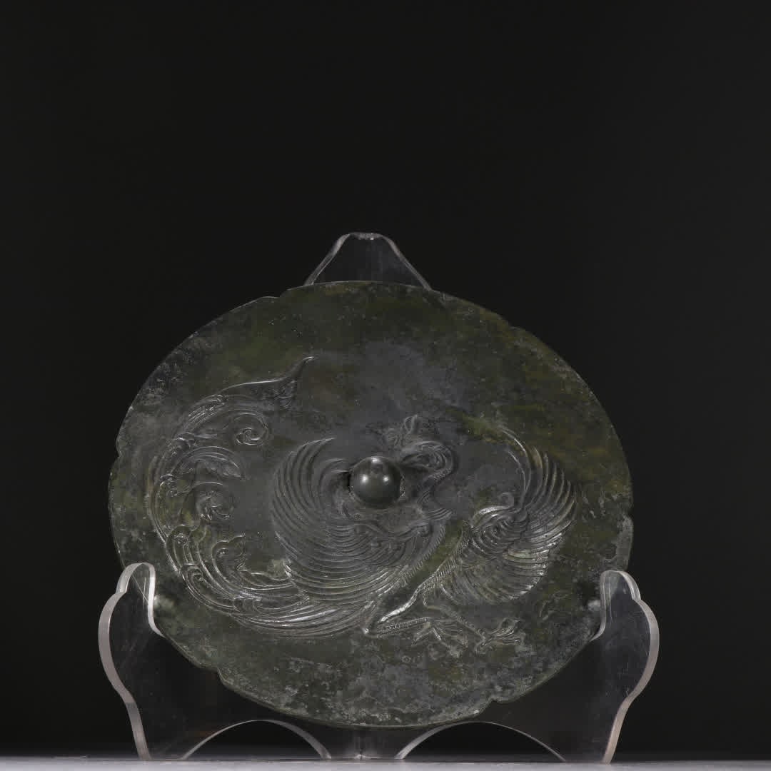 A Tang phoenix pattern bronze mirror (1 of 9)