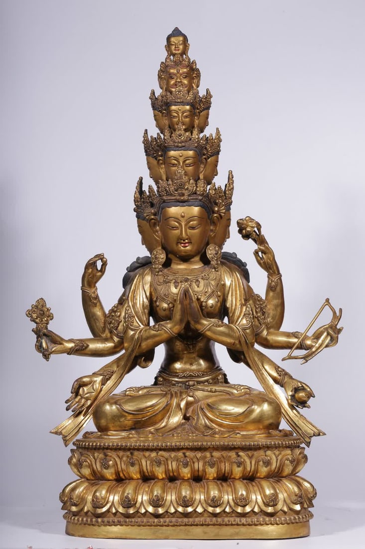 A seated statue of Guanyin with eight arms and eight faces in copper gilt in the Qing Dynasty: Qing Dynasty copper gilt eight-armed eleven-sided Guanyin seated statue SIZE: H:64.5cm L:40cm W:22cm W:13.1kg (The Dimensions Of All Batches Are Manually Measured.If You Need More Detailed Information